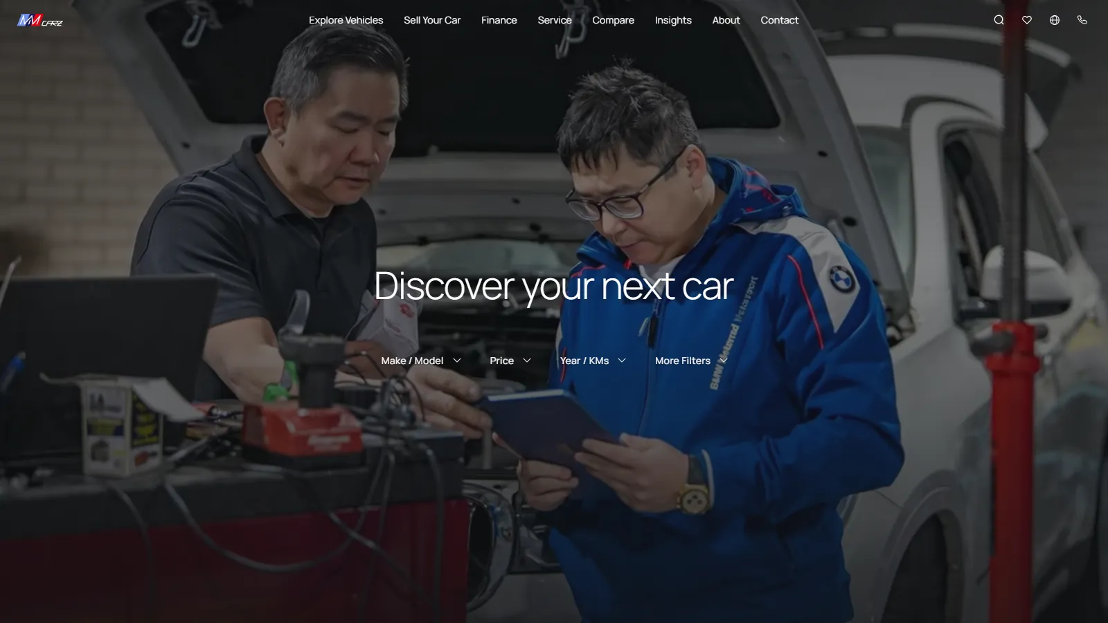 The mmcarz.com.au home page: “Discover your next car” over a photo of two staff at a car, with filters by make, price, year and kilometres.